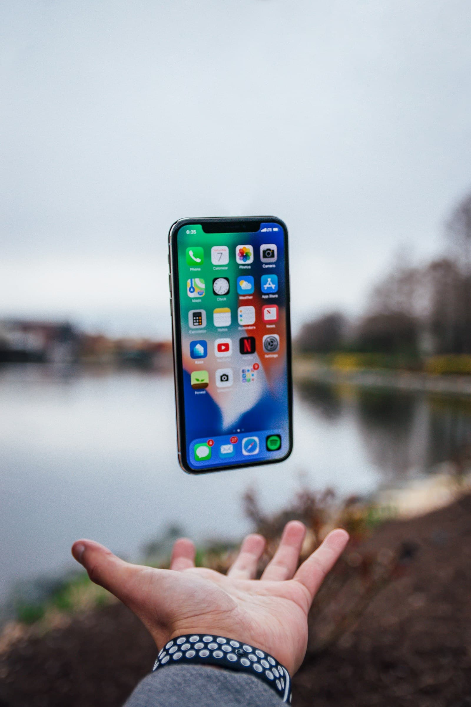 Person looking at their phone making a decision